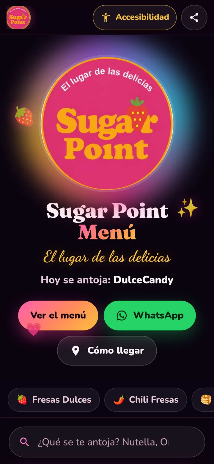 Captura en celular del menú digital de Sugar Point: logotipo rosa y dorado, título Sugar Point Menú, la frase El lugar de las delicias y botones grandes para ver el menú, escribir por WhatsApp y cómo llegar; arriba, el botón Accesibilidad.
